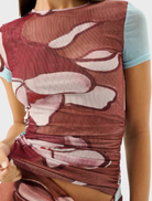 Marly Tee in Marisol Bloom style, displaying a cheerful floral design on a soft fabric, perfect for laid-back fashion.