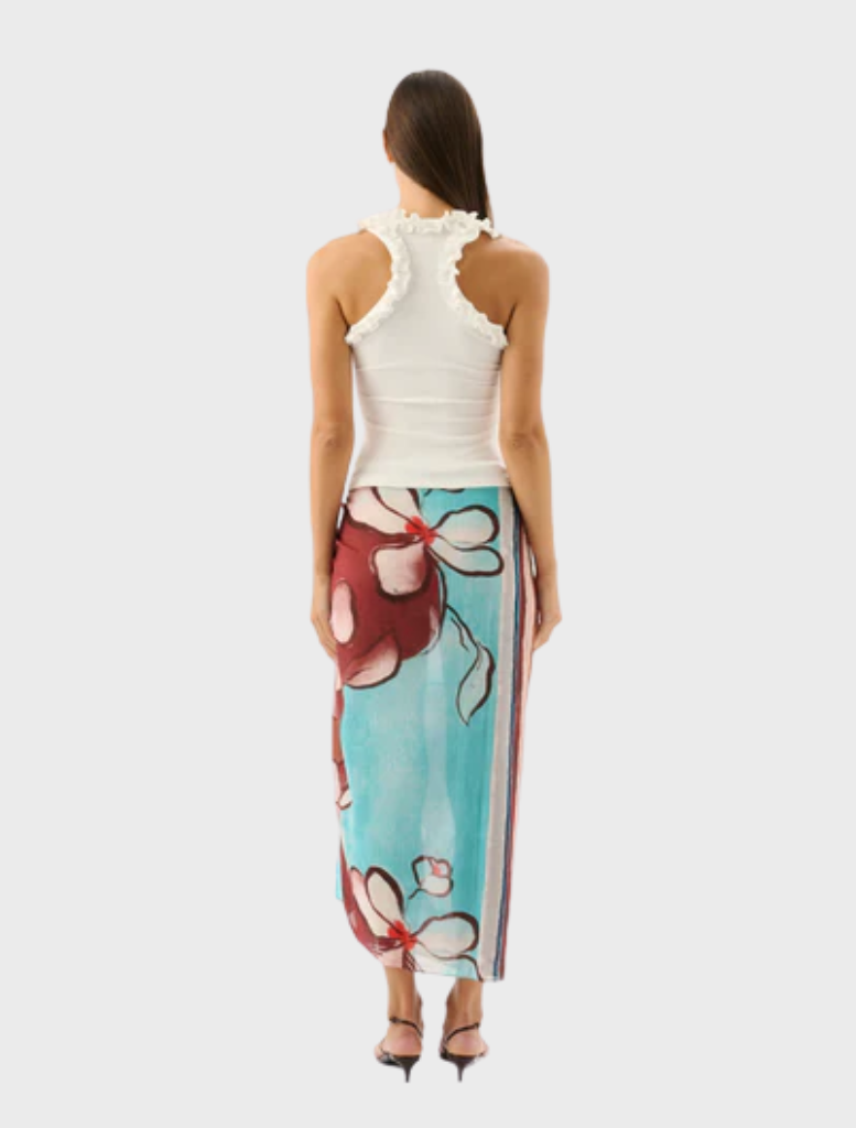 The Paloma Tank in ivory, presented on a model, illustrating its comfortable fit and stylish simplicity for casual occasions.