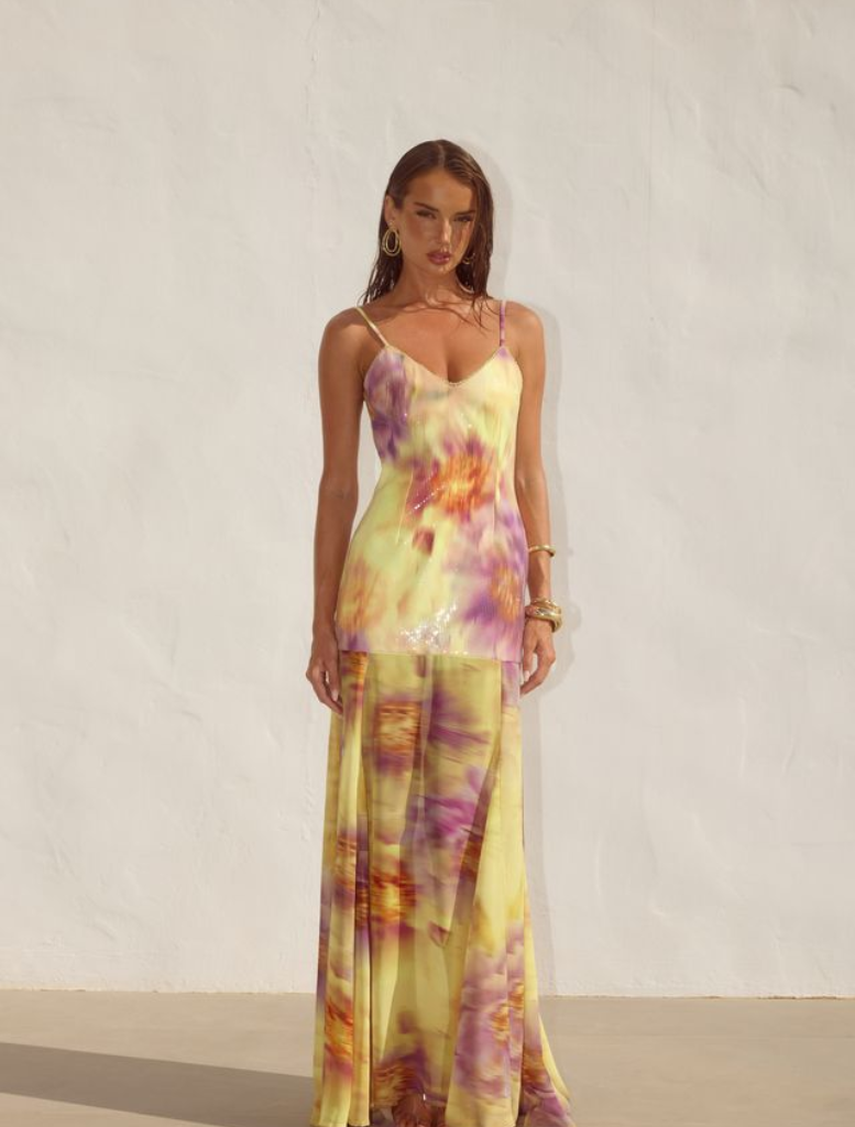 Tulia Low Back Maxi Dress in Suri Yellow, combining a bright hue with a sophisticated low back for a fashionable summer outfit.