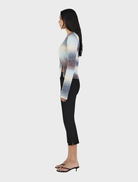 Stylish cocoa gradient cardigan with an asymmetrical cut, perfect for adding warmth and flair to any outfit.