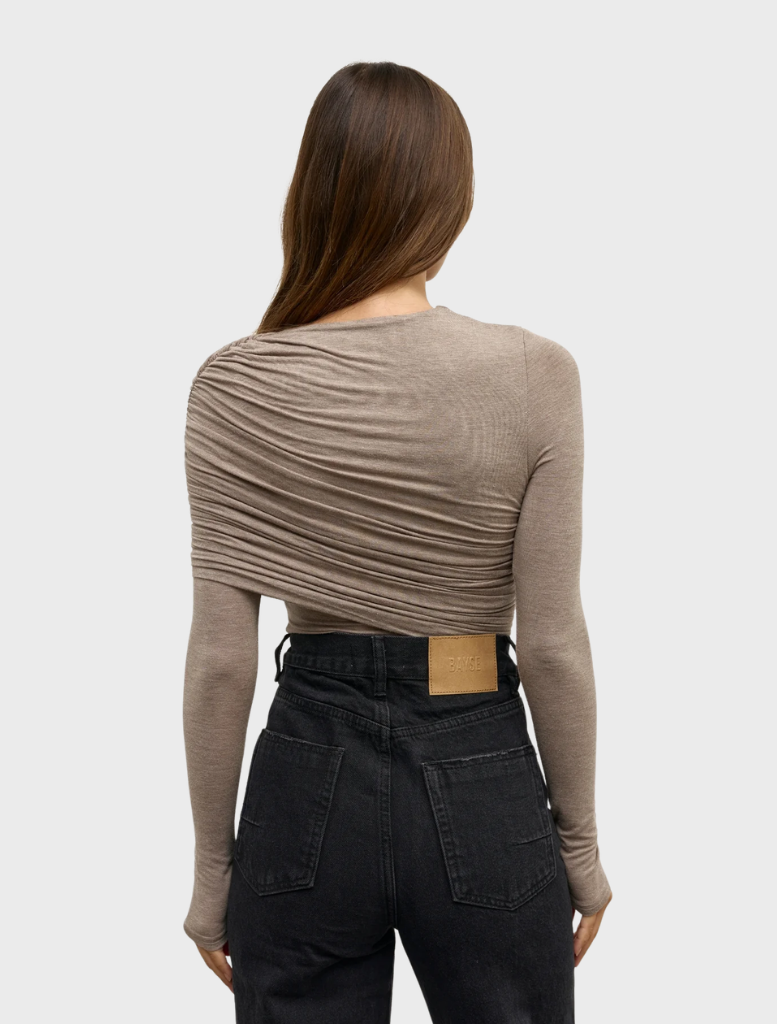 Grey marle Ariya bodysuit shown on a hanger, emphasizing its contemporary style and soft fabric.