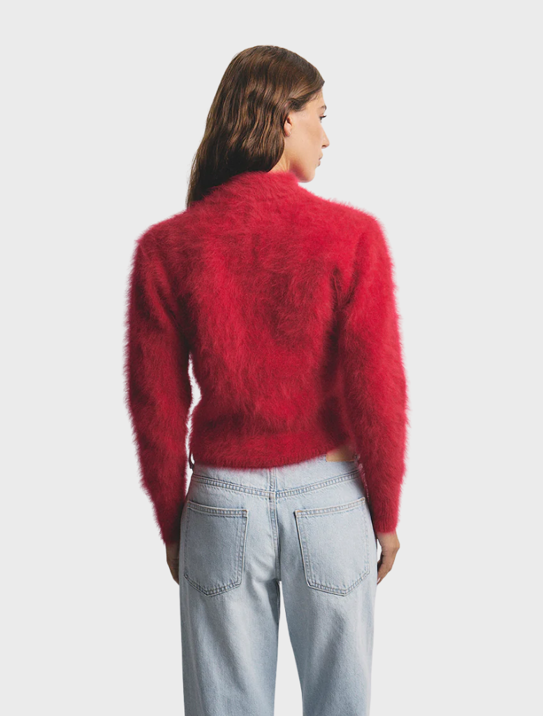 Elegant Bella Cashmere Cardigan in a striking flame shade, perfect for adding warmth and style to your outfit.