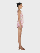 Rosewash Daisy Lana Top, adorned with a lovely floral motif in soft pink, ideal for spring and summer wear.