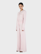 Elegant blush Lucielle Cashmere Cardigan, emphasizing its refined style and plush material, ideal for any occasion.