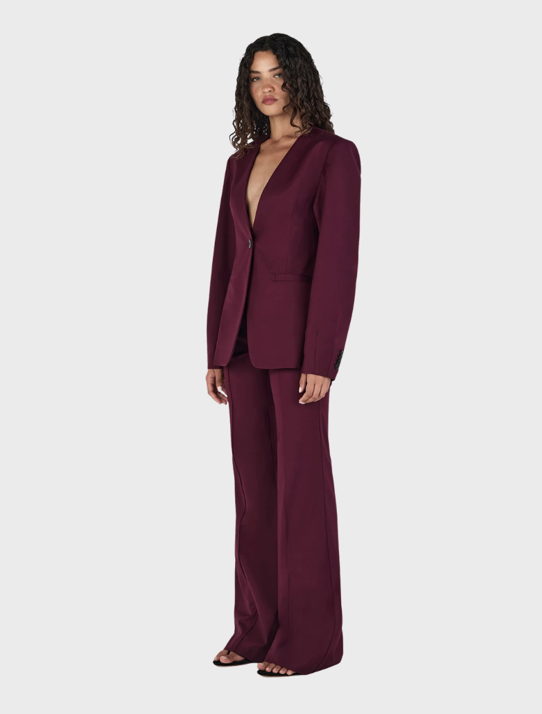 Stylish maroon collarless blazer from Maxine, perfect for adding a touch of sophistication to any outfit.