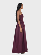 Portia Maxi Dress in a deep Mulberry hue, offering a sophisticated look with its long, elegant design.