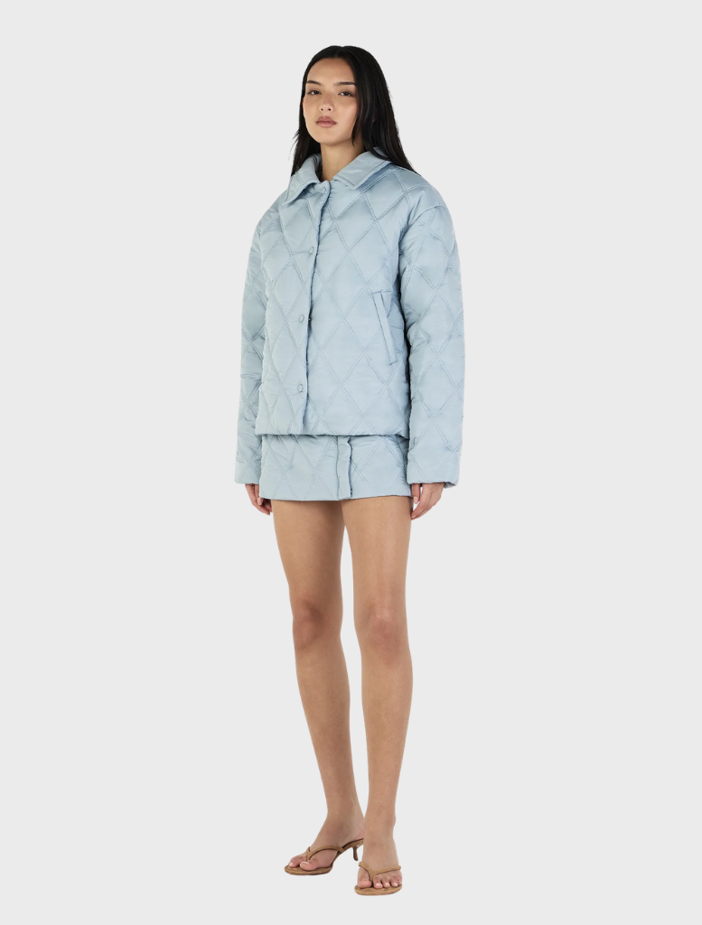 Quinton's ice blue quilted jacket, offering a modern look with cozy insulation for colder climates.