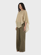 Elegant Simona Poncho in pistachio, designed for comfort and style in casual or formal settings.