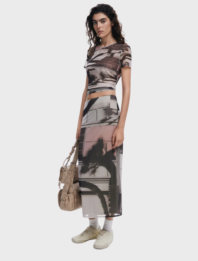 Chic straight tulle skirt with an eye-catching arty print, offering a modern and artistic flair to any wardrobe.