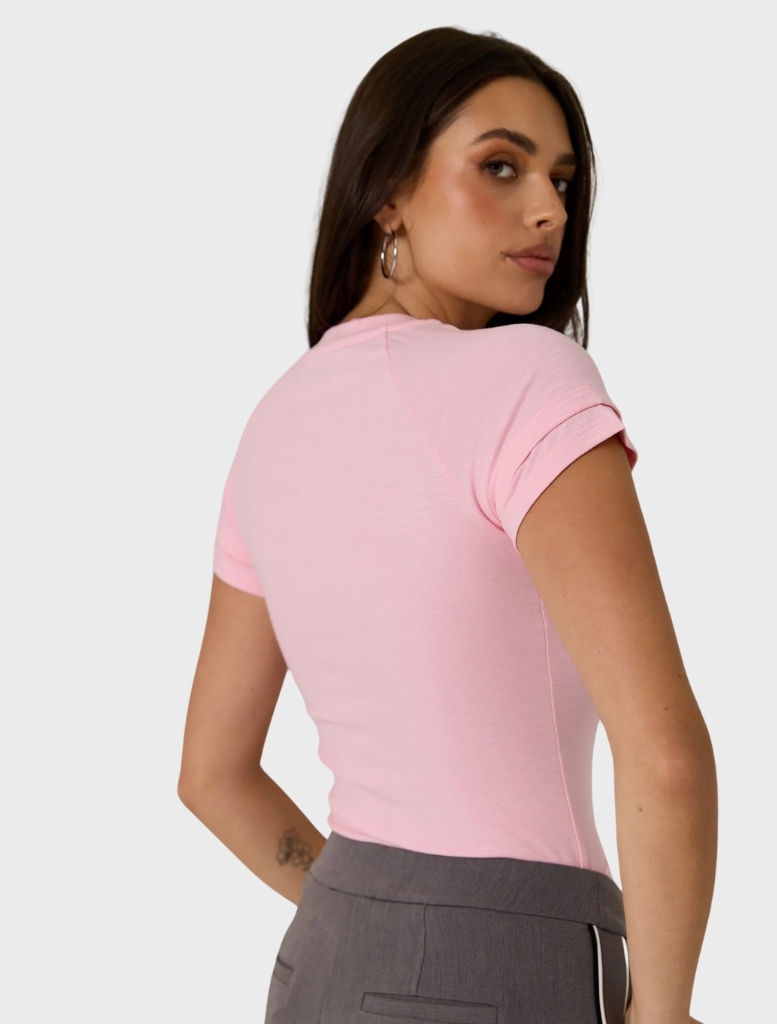 Zarah Baby Tee in vibrant pop pink, designed for comfort and style, ideal for casual occasions.