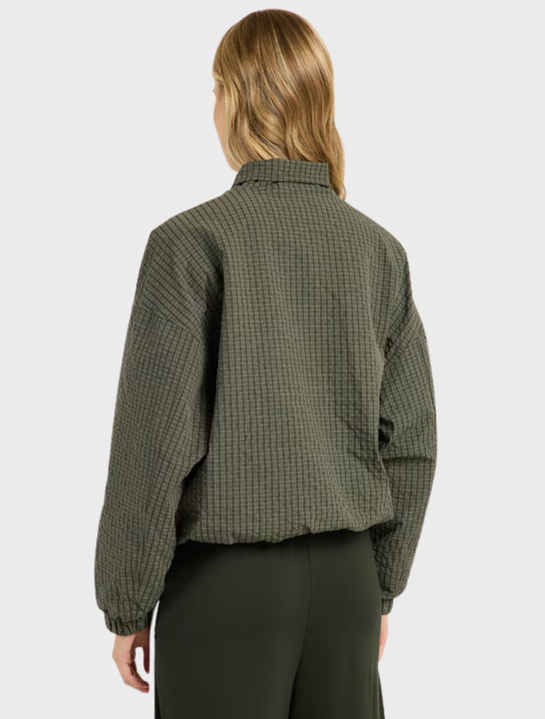 Contemporary olive micro check jacket with a funnel neckline, two-way zip, and angled pockets for effortless style.